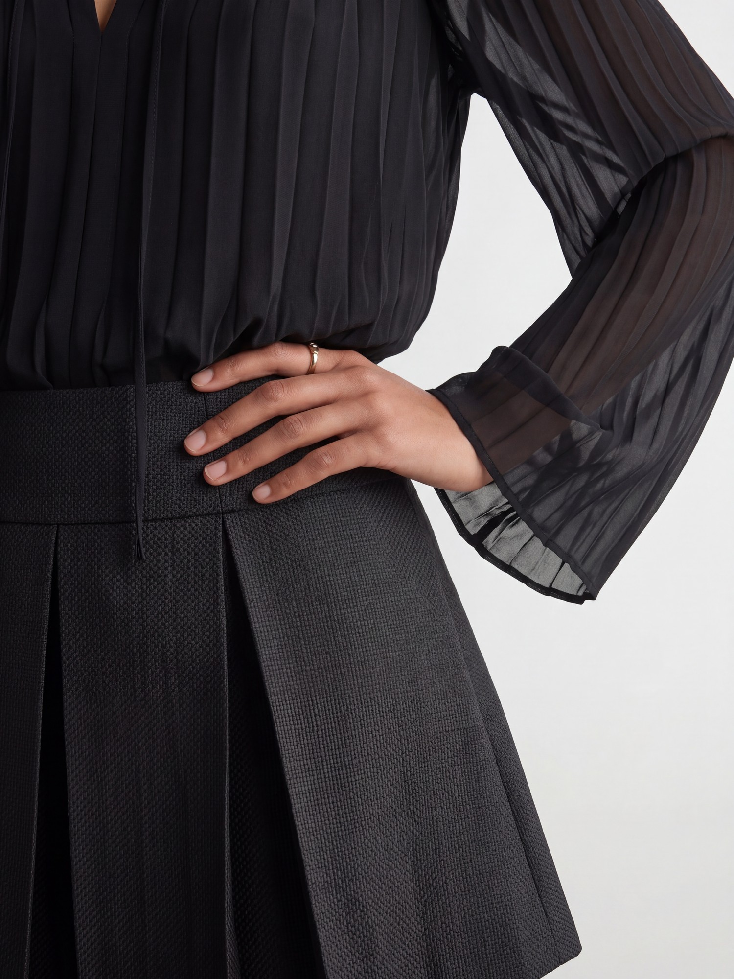 Editorial, pleated blouse detail