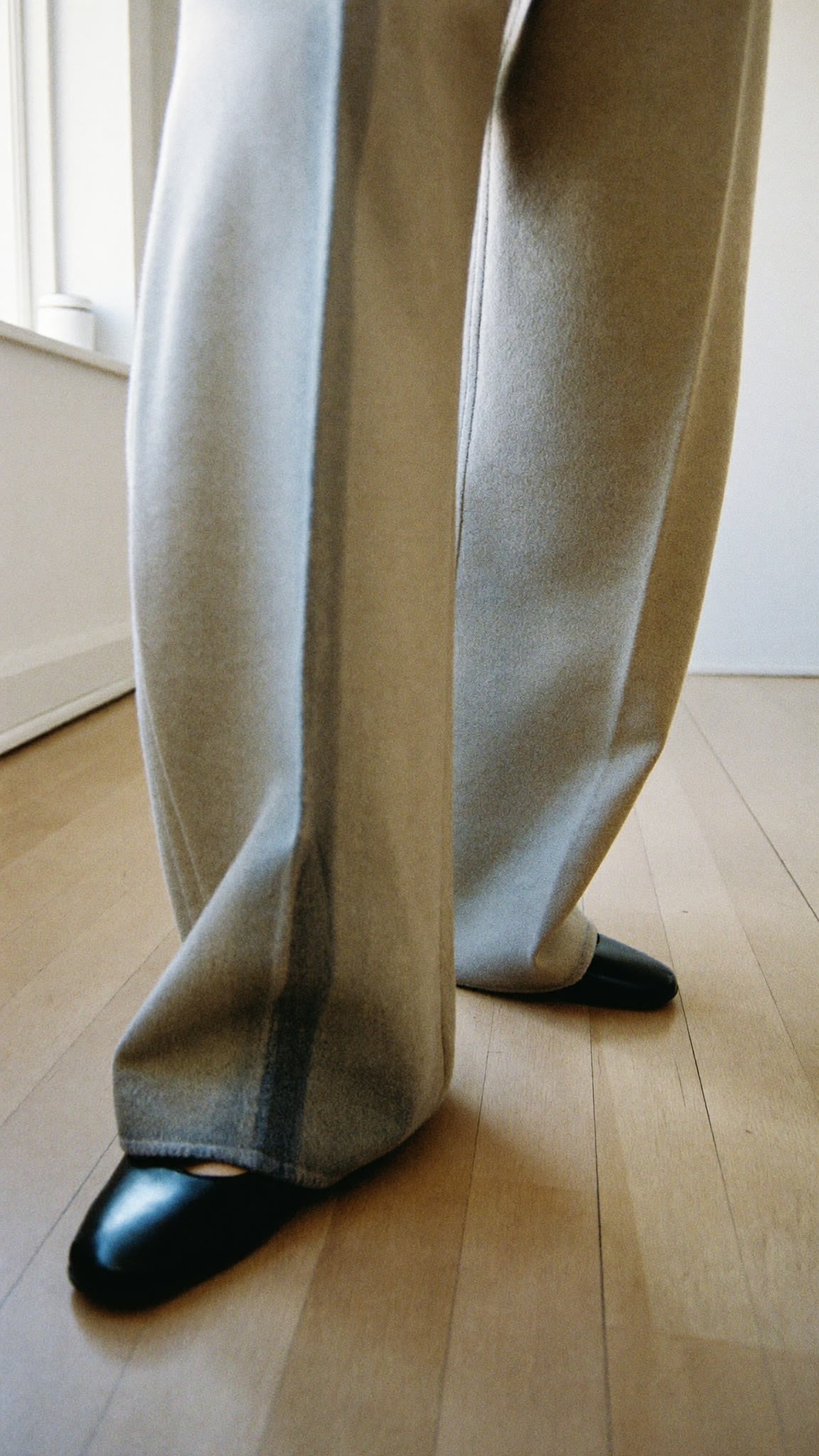 Minimal, wide wool trousers, hem detail